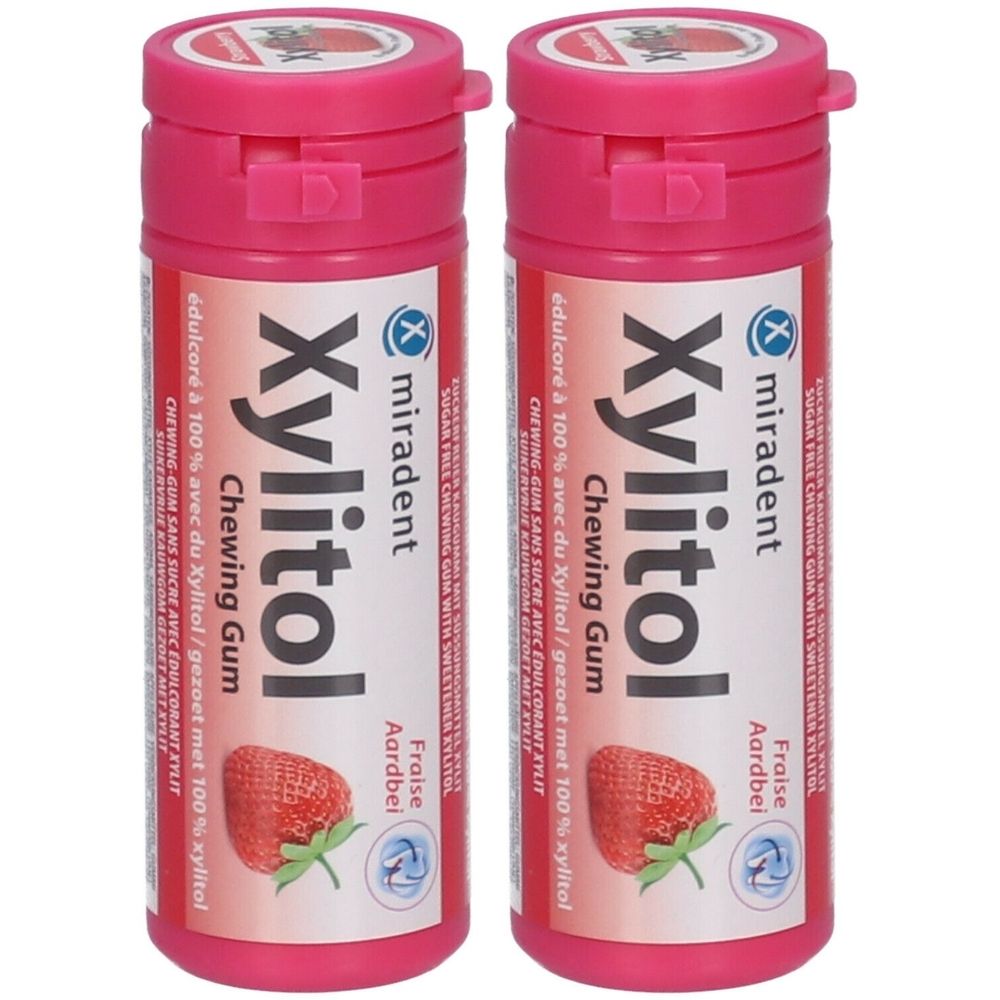 Zwei rosa Behälter mit Xylitol-Kaugummi. Aufschrift: miradent, Erdbeere, zuckerfrei. Deckel mit Klappverschluss.