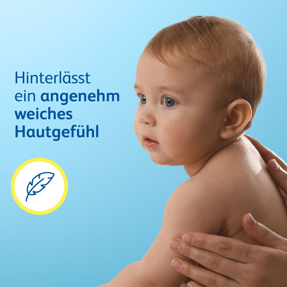 Baby mit weicher Haut. Text: Hinterlässt ein angenehm weiches Hautgefühl. Feder-Symbol.