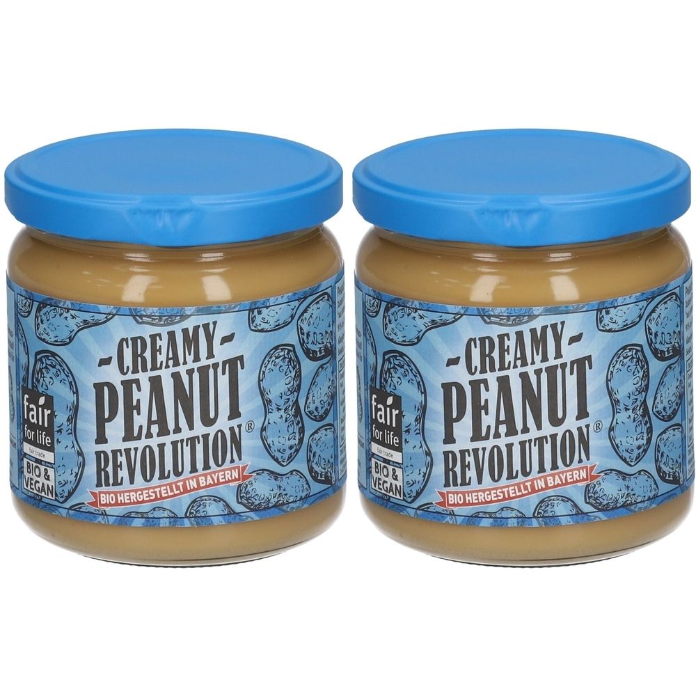 Zwei Gläser Erdnussbutter mit blauem Deckel. Aufschrift: Creamy Peanut Revolution, Bio & Vegan, hergestellt in Bayern.