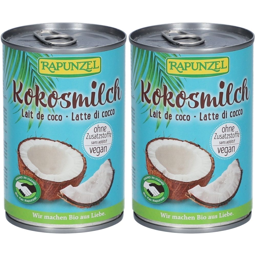 Zwei Dosen Kokosmilch. Aufschrift: RAPUNZEL, Kokosmilch, Lait de coco, Latte di cocco, ohne Zusatzstoffe, vegan. Abbildung einer Kokosnuss.
