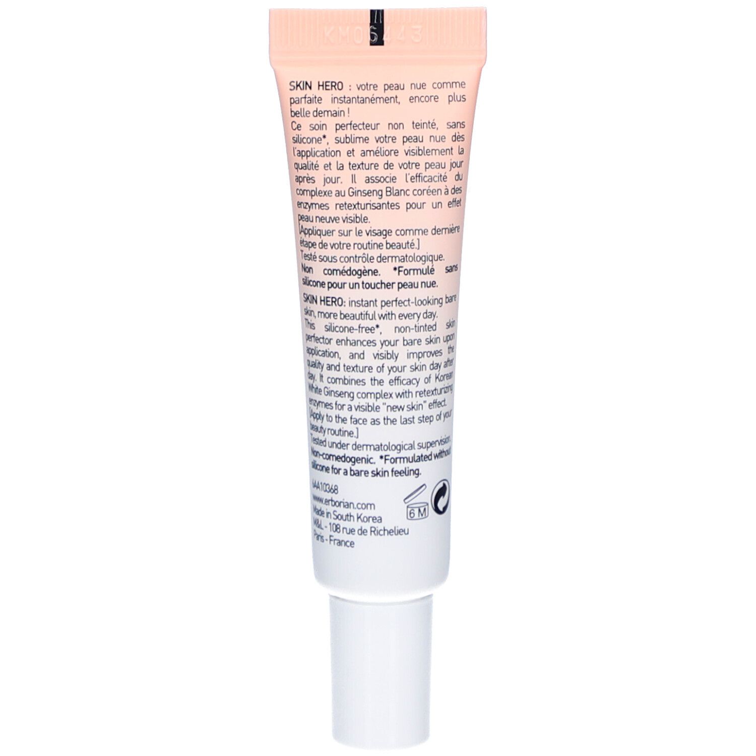 Rückseite der Creme-Tube. Text in Französisch. Enthält Informationen zur Anwendung und Inhaltsstoffe. Weißer Schraubverschluss.