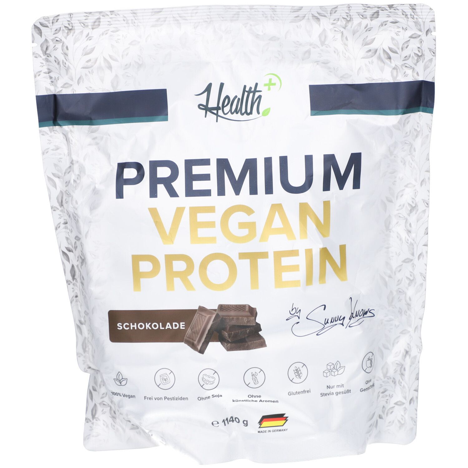 Beutel mit "Health+" Premium Vegan Protein. Aufschrift "Schokolade". Abbildung von Schokoladenstücken. Siegel "Made in Germany".
