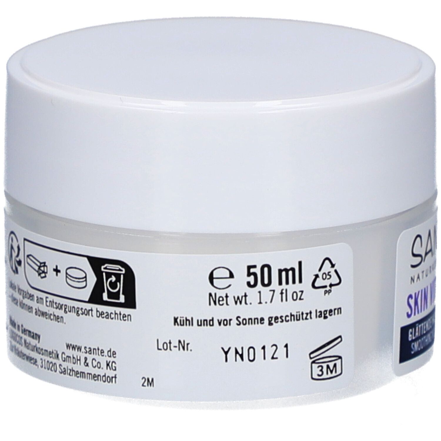 Weiße Creme-Dose. Rückseite mit Informationen. 50 ml. Haltbarkeitssymbol. Hergestellt in Deutschland.