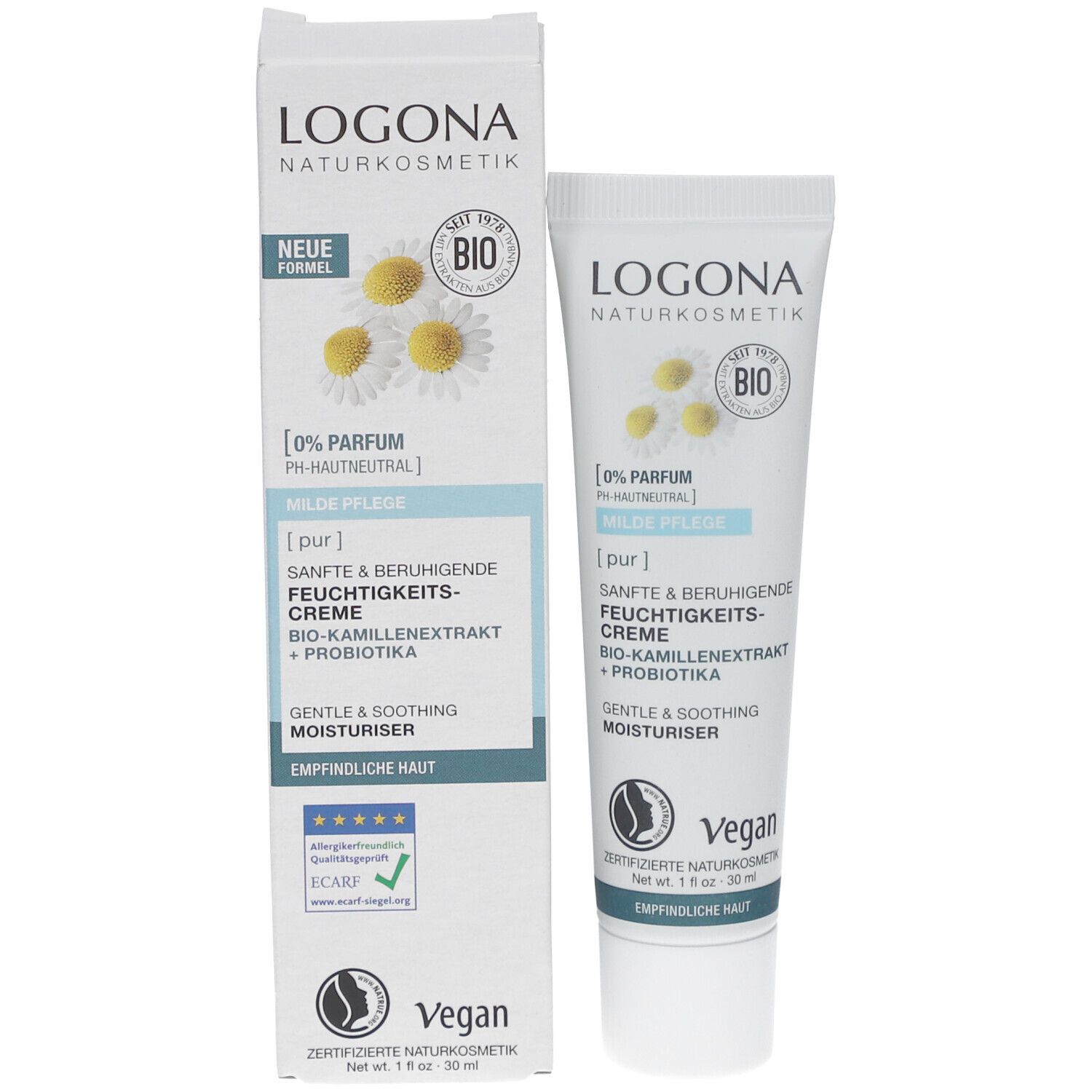 Produktverpackung mit Creme-Tube und Karton. LOGONA-Logo, Kamillenblüten, Text. Vegan, für empfindliche Haut.