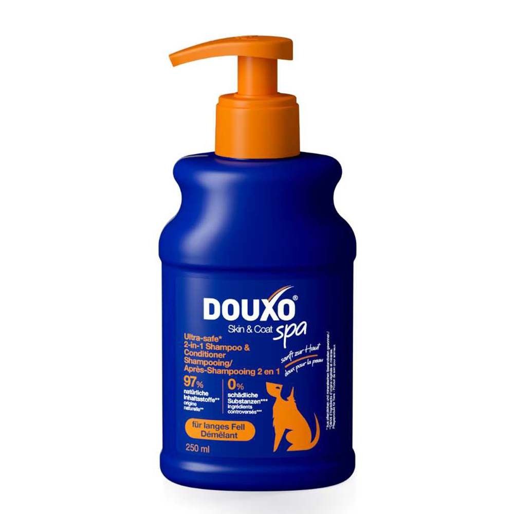 Blaue Flasche mit orangefarbenem Pumpkopf. DOUXO® Skin & Coat spa 2-in-1 Shampoo & Conditioner. 250 ml.
