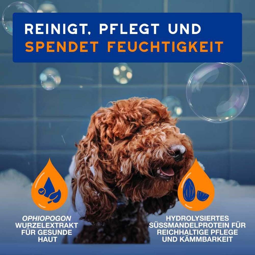 Hund mit Schaum. Text: Reinigt, pflegt und spendet Feuchtigkeit. Ophiopogon Wurzelextrakt. Hydrolysiertes Süßmandelprotein.