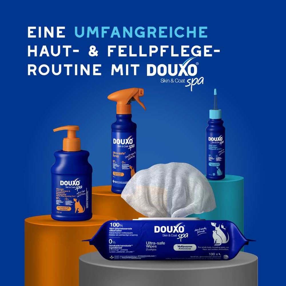Verschiedene Produkte der Marke DOUXO® Skin & Coat spa. Sprays, Tücher, Flaschen.