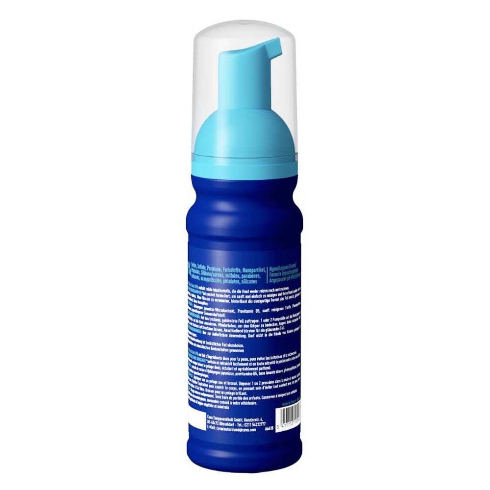 Blaue Flasche mit blauem Sprühkopf. Aufschrift DOUXO® Skin & Coat spa. Rückseite mit Text.