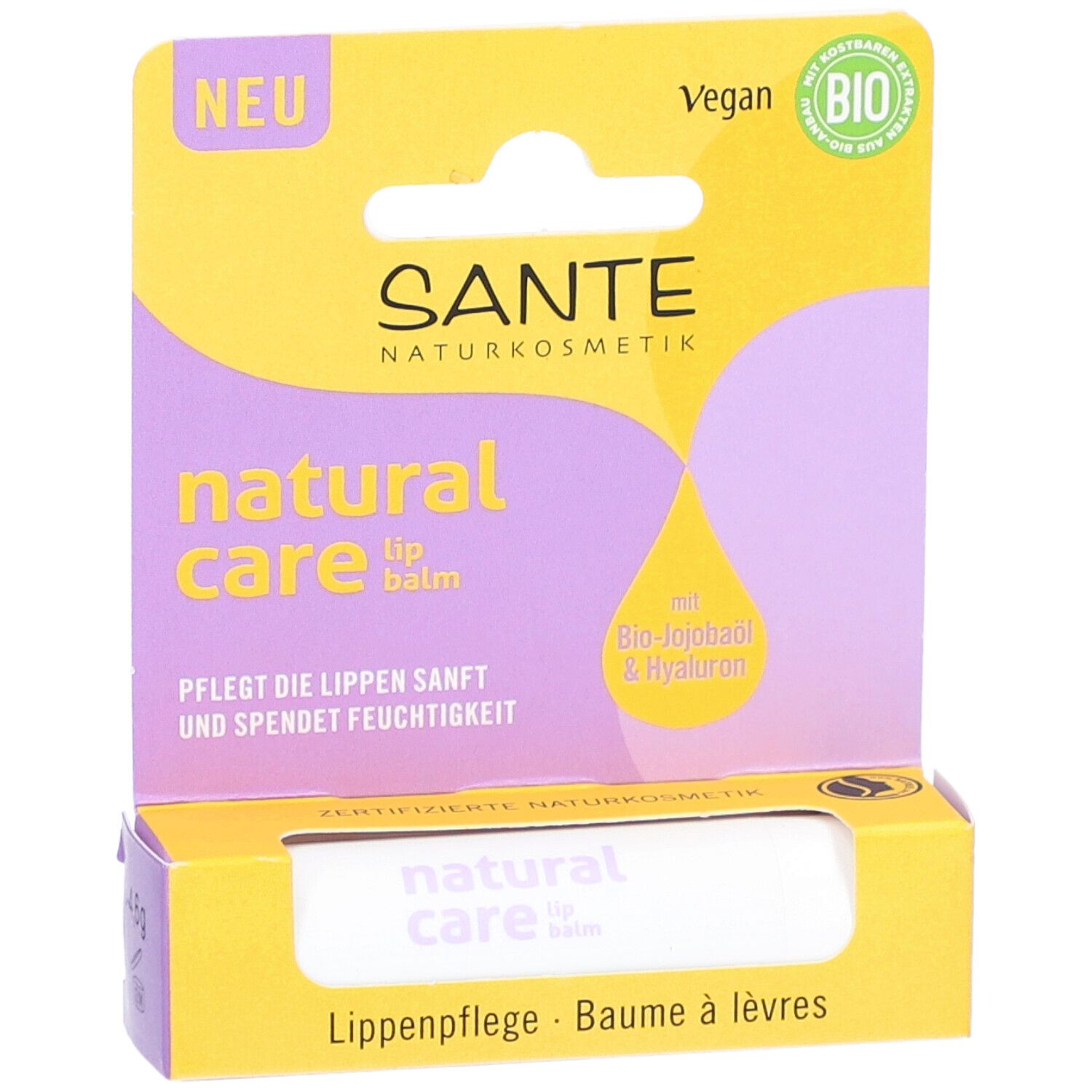 Lippenbalsam in Verpackung. Gelbe und lila Verpackung mit Produktnamen und Bio-Siegel. Vegan.