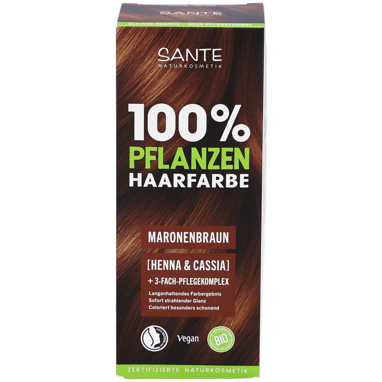 Vorderseite der Pflanzenhaarfarben-Verpackung. Aufschrift: 100% Pflanzenhaarfarbe, Maronenbraun. Vegan-Logo und Bio-Siegel.