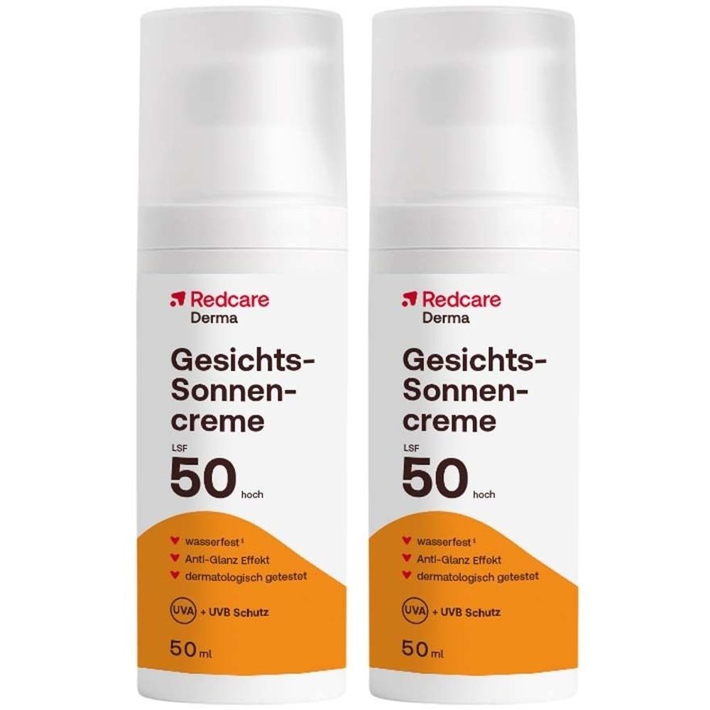 Zwei Flaschen Gesichts-Sonnencreme LSF 50. Weiße Flaschen mit orangefarbenem Etikett. Produktname und Schutzfaktor deutlich sichtbar.