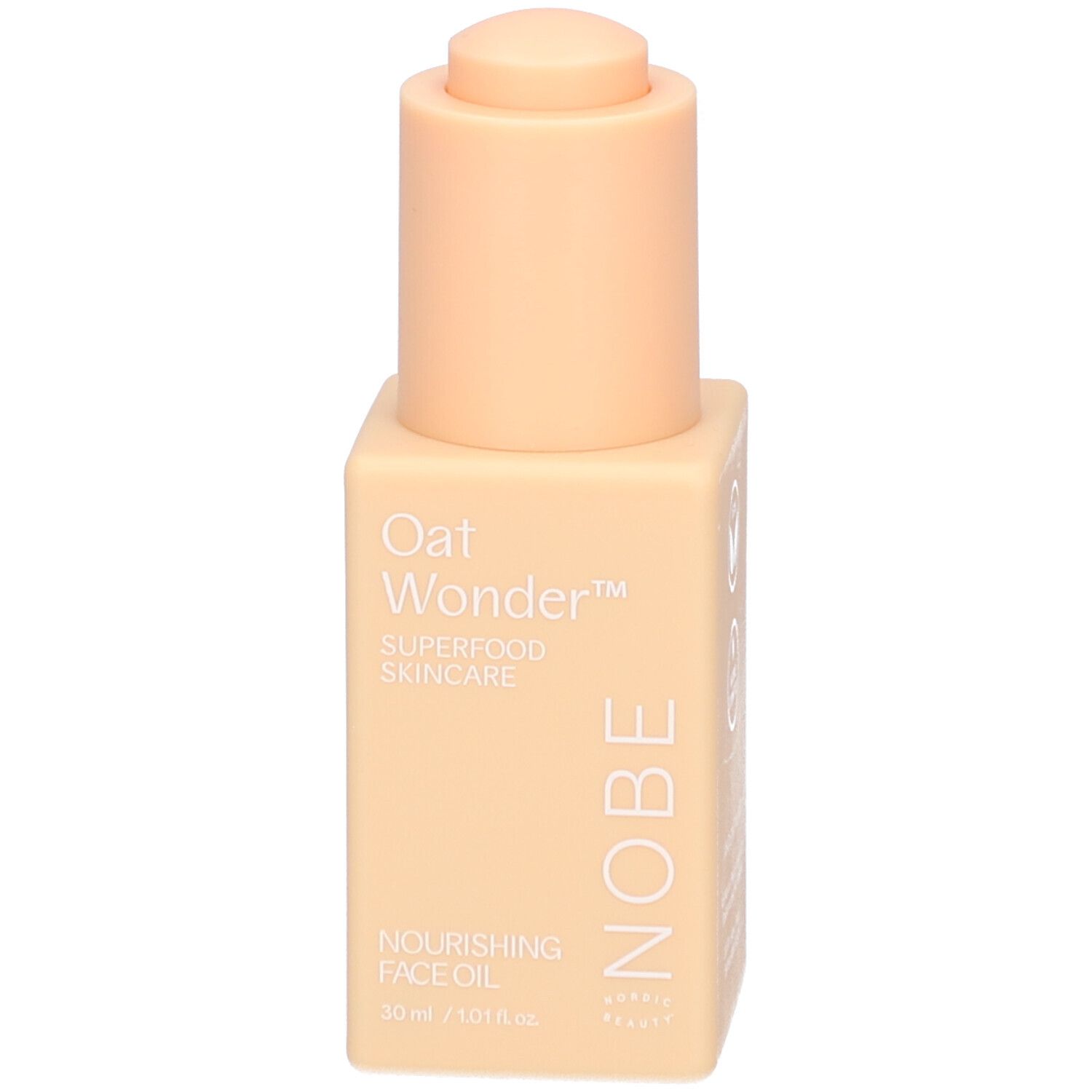 Beige quadratische Flasche mit Pumpe. Aufschrift: Oat Wonder, Superfood Skincare, Nourishing Face Oil, NOBE.