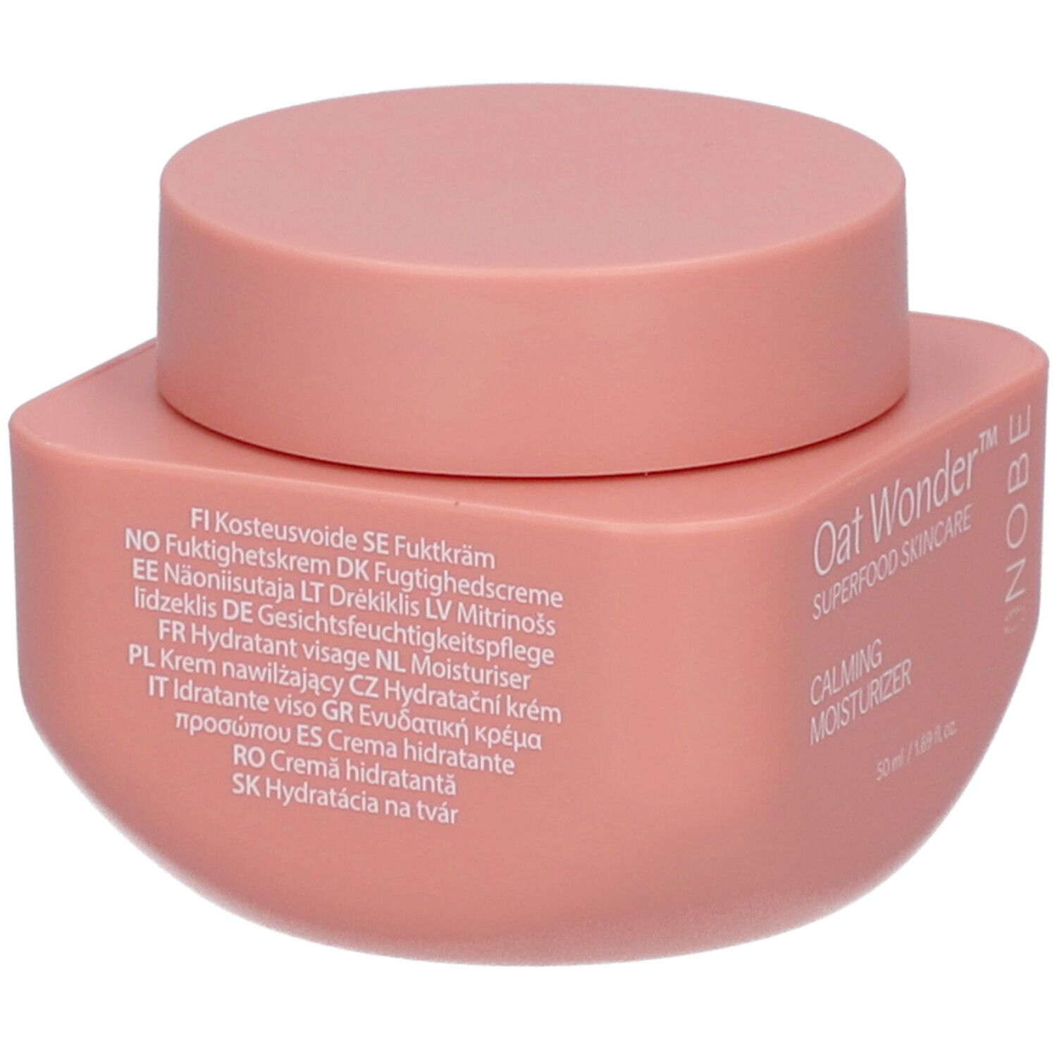 Rosa Tiegel mit Deckel. Aufschrift: Oat Wonder, Superfood Skincare, Calming Moisturizer. Mehrsprachige Produktinformationen.