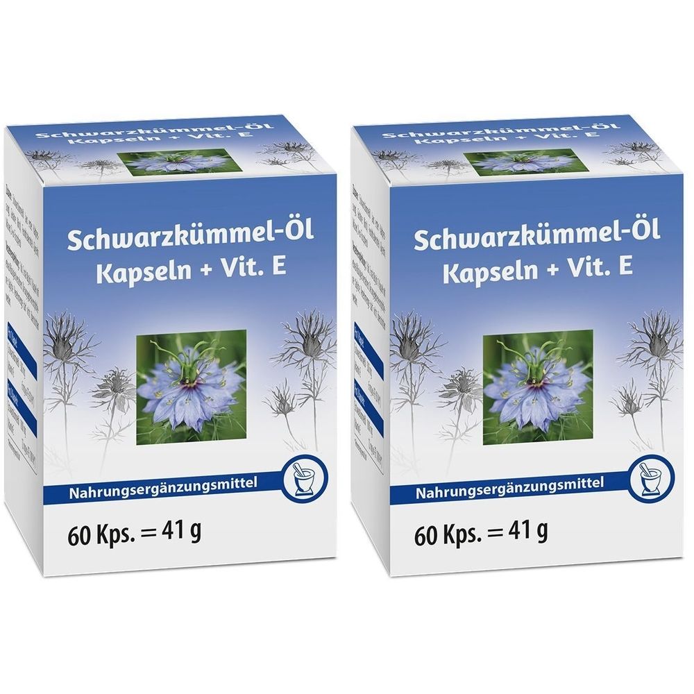 Zwei weiße Kartons mit Produktaufdruck. Aufschrift: Schwarzkümmel-Öl Kapseln + Vit. E. Abbildung einer blauen Blume. Text: Nahrungsergänzungsmittel, 60 Kps. = 41 g.