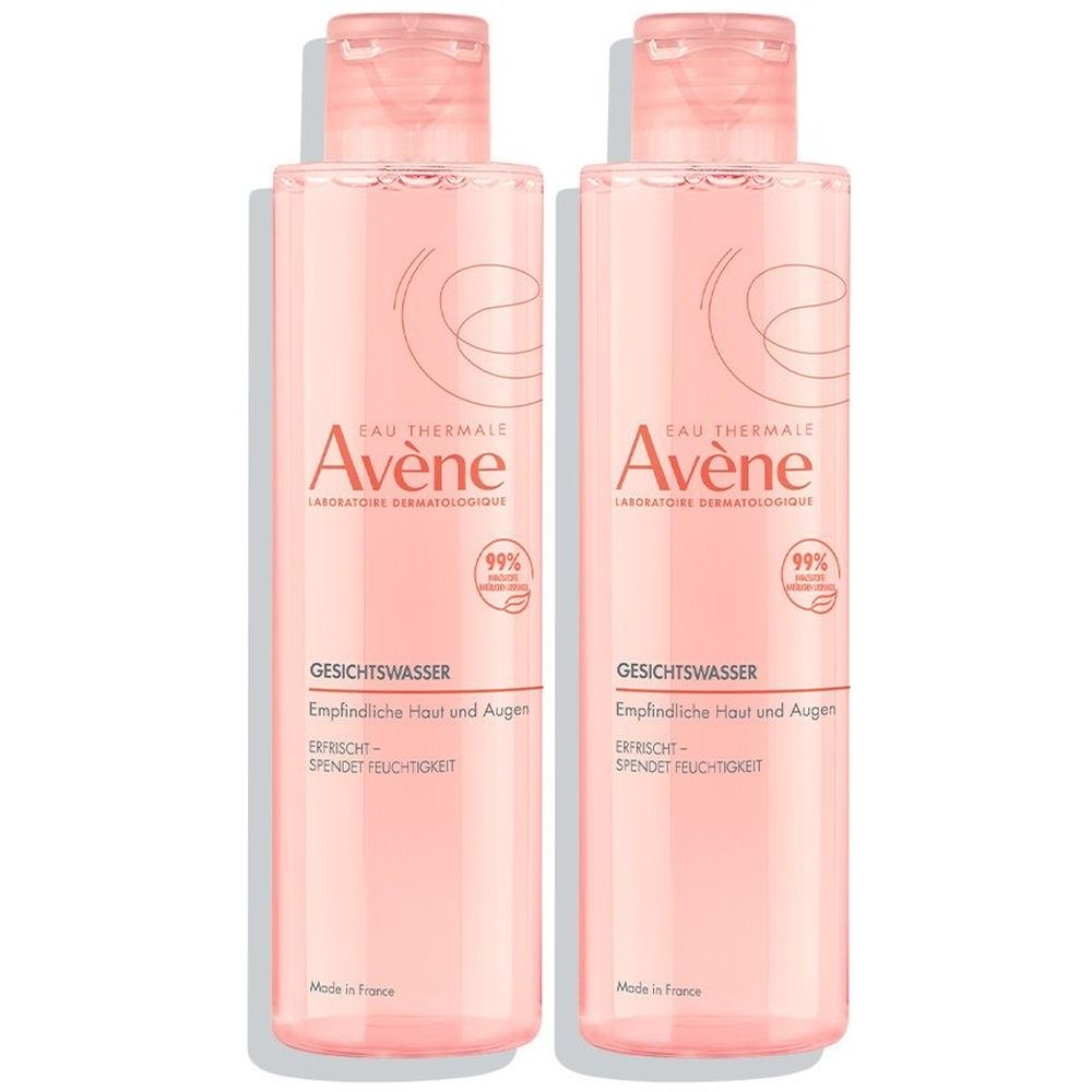 Zwei Flaschen Gesichtswasser. Rosa Flüssigkeit in transparenten Flaschen mit rosa Deckel. Aufschrift: Avène, Gesichtswasser.