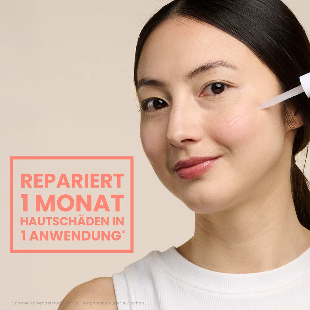 Frau trägt Avène Cicalfate+ Serum mit Pipette auf die Haut auf.