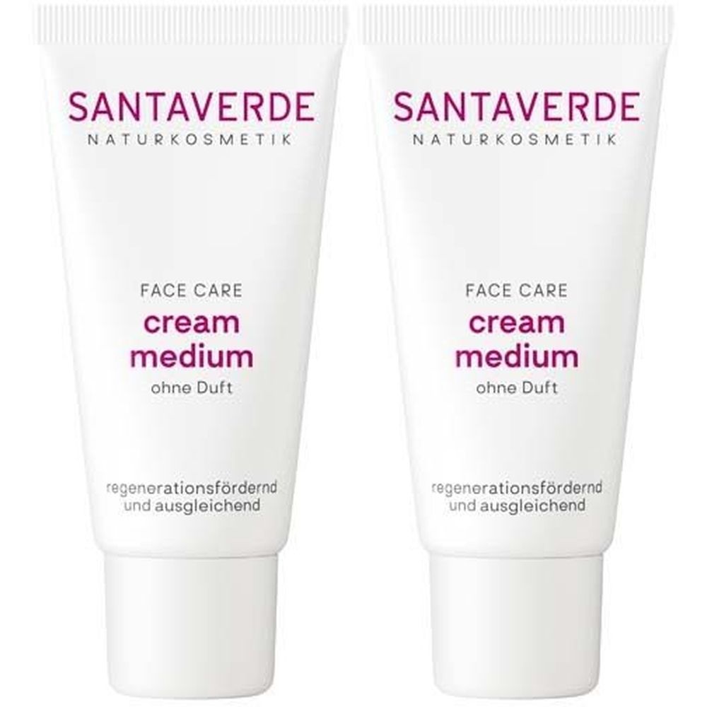 Zwei weiße Tuben. Aufschrift: SANTAVERDE, Face Care cream medium ohne Duft. Regenerationsfördernd und ausgleichend.