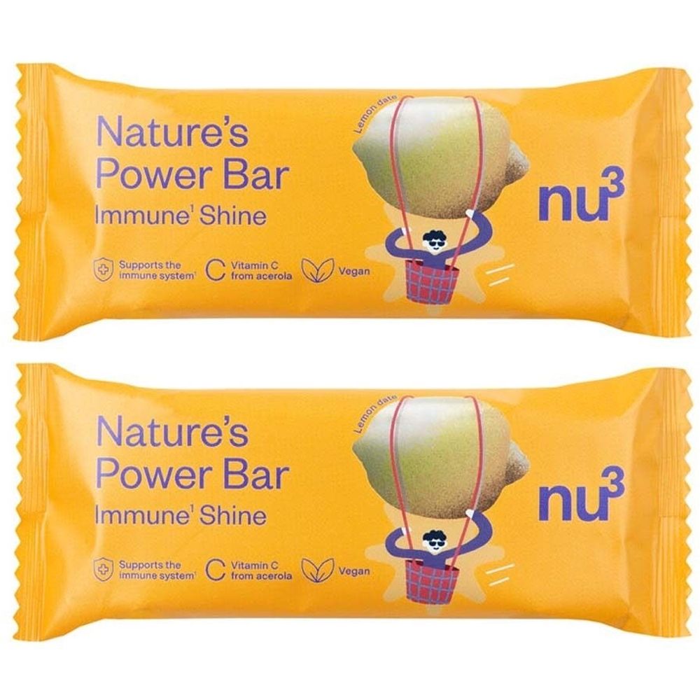 Zwei gelbe Riegel mit Aufschrift Nature's Power Bar Immune Shine, Logo nu3 und Illustration einer Zitrone im Heißluftballon.
