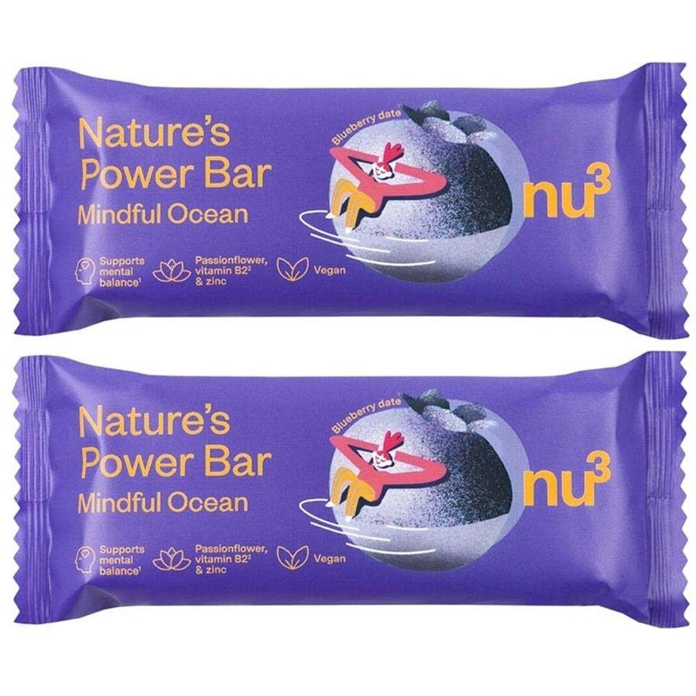 Zwei violette Riegelpackungen. Aufschrift: Nature's Power Bar Mindful Ocean. Enthält Passionsblume, Vitamin B2 und Zink. Vegan.