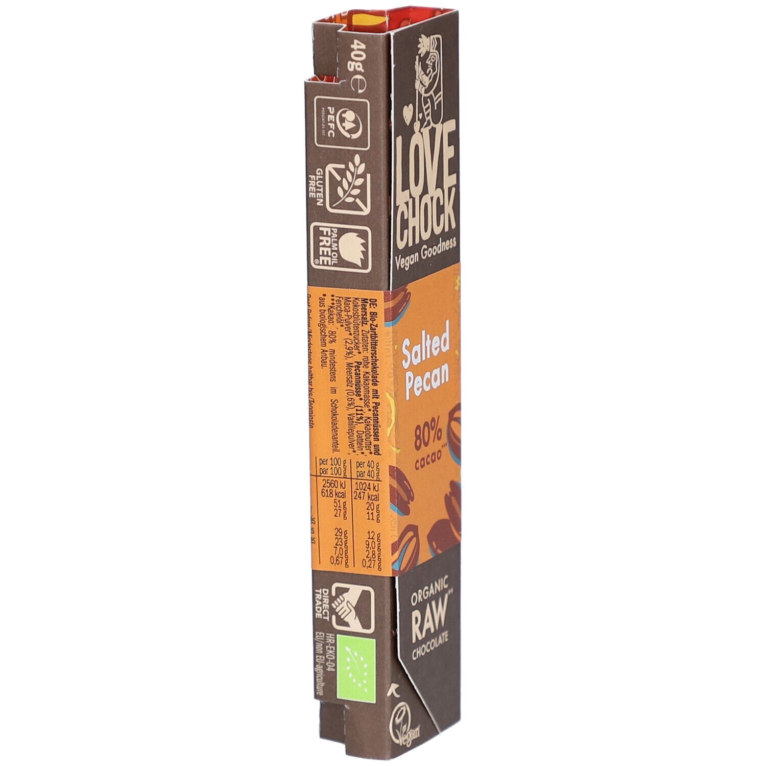 Schokoladenverpackung mit Logo und Produktbezeichnung. Enthält "Salted Pecan", "80% cacao" und "Organic Raw Chocolate". Vegan. Rückseite mit Text.