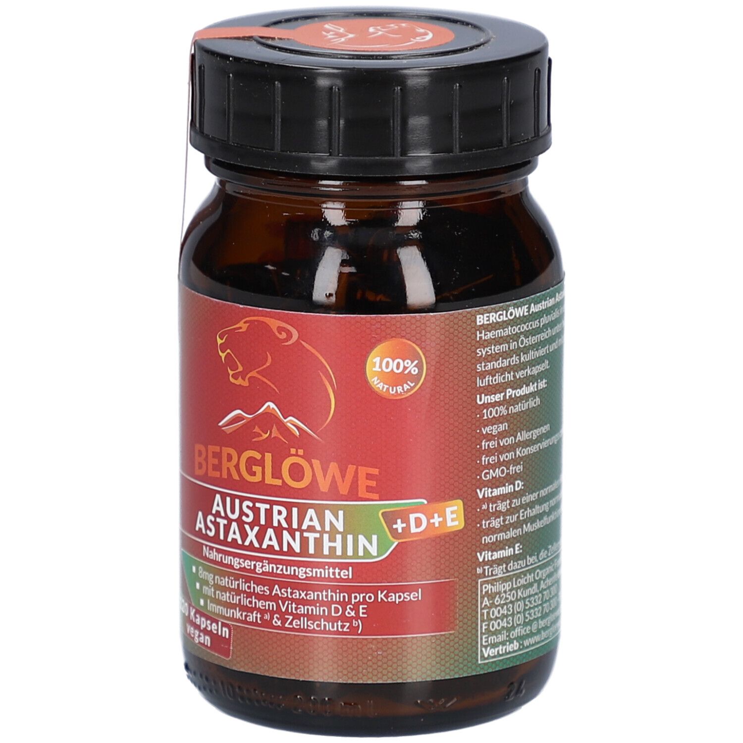 Braune Glasflasche mit schwarzem Deckel. Etikett mit "Berglöwe Austrian Astaxanthin" und "100% natürlich".