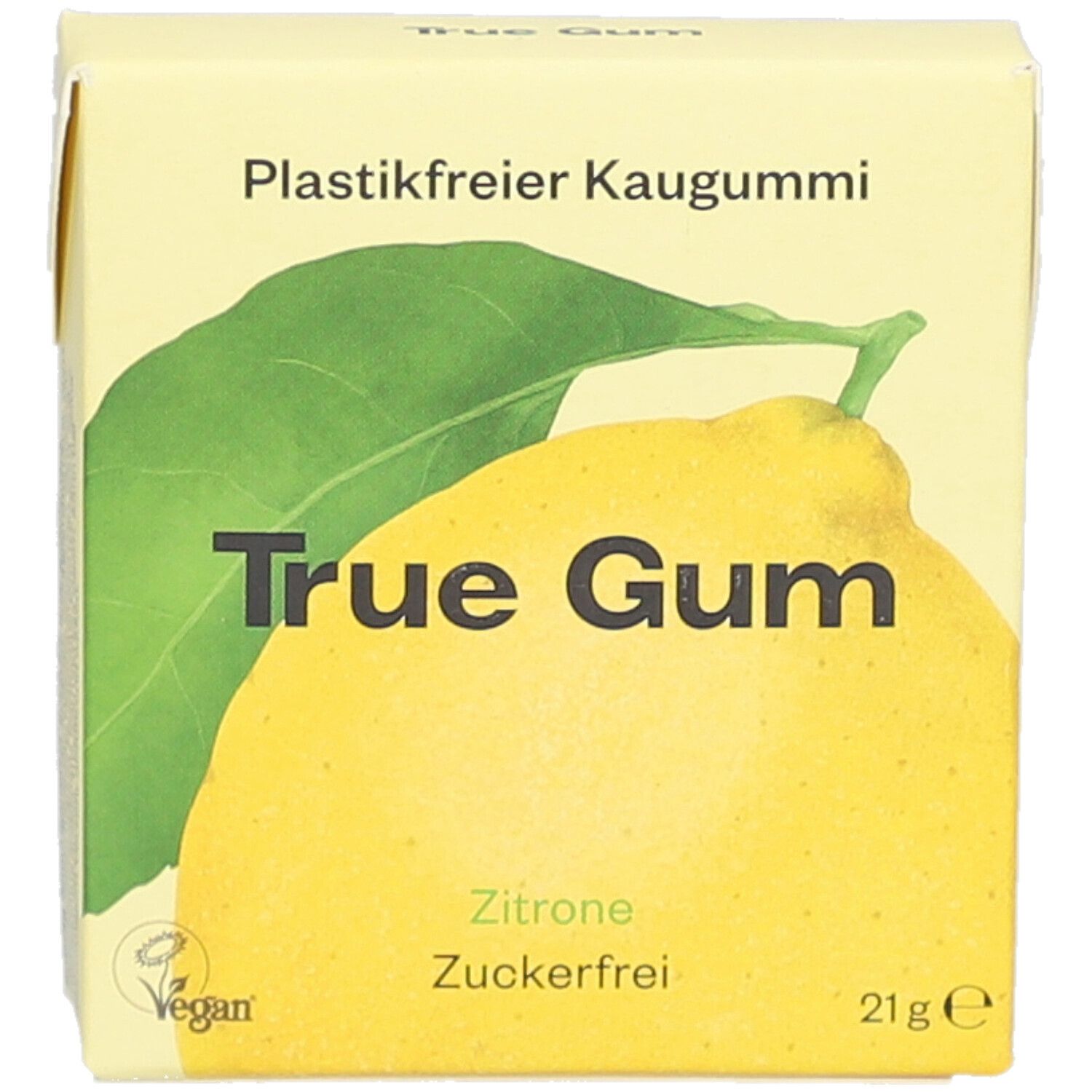 Gelbe Verpackung mit Zitrone-Illustration. Text: True Gum, Zitrone, Zuckerfrei, 21g. Vegan-Logo. Aufschrift: Plastikfreier Kaugummi.