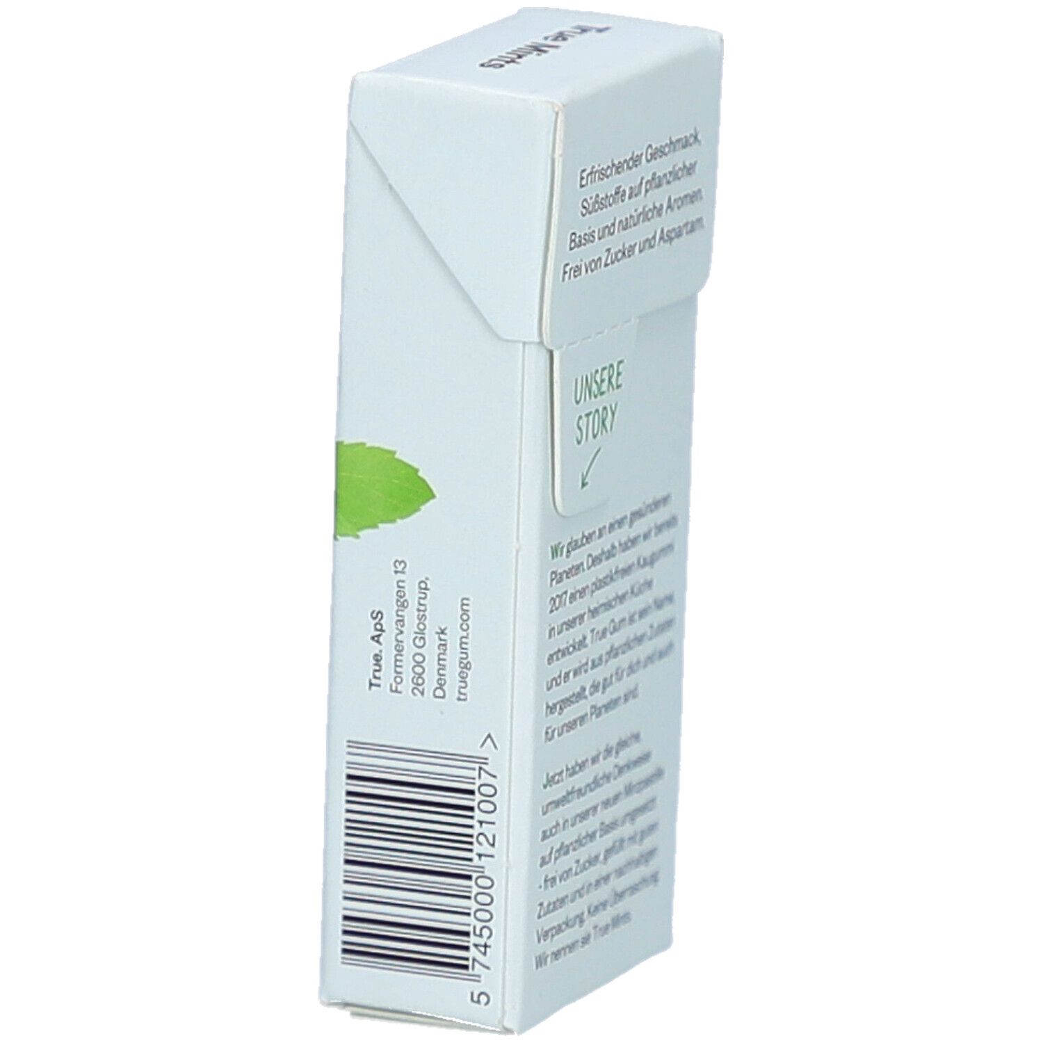 Weißer Karton mit Text, Barcode und Firmenadresse. Vegan-Siegel.