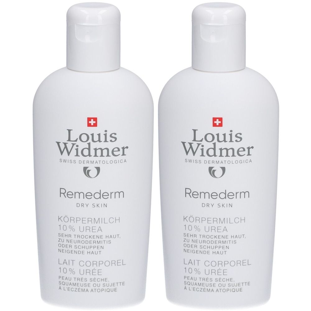 Zwei weiße Flaschen Louis Widmer Remederm Körpermilch. Aufschrift: 10% Urea, für trockene Haut. Schweizer Kreuz.