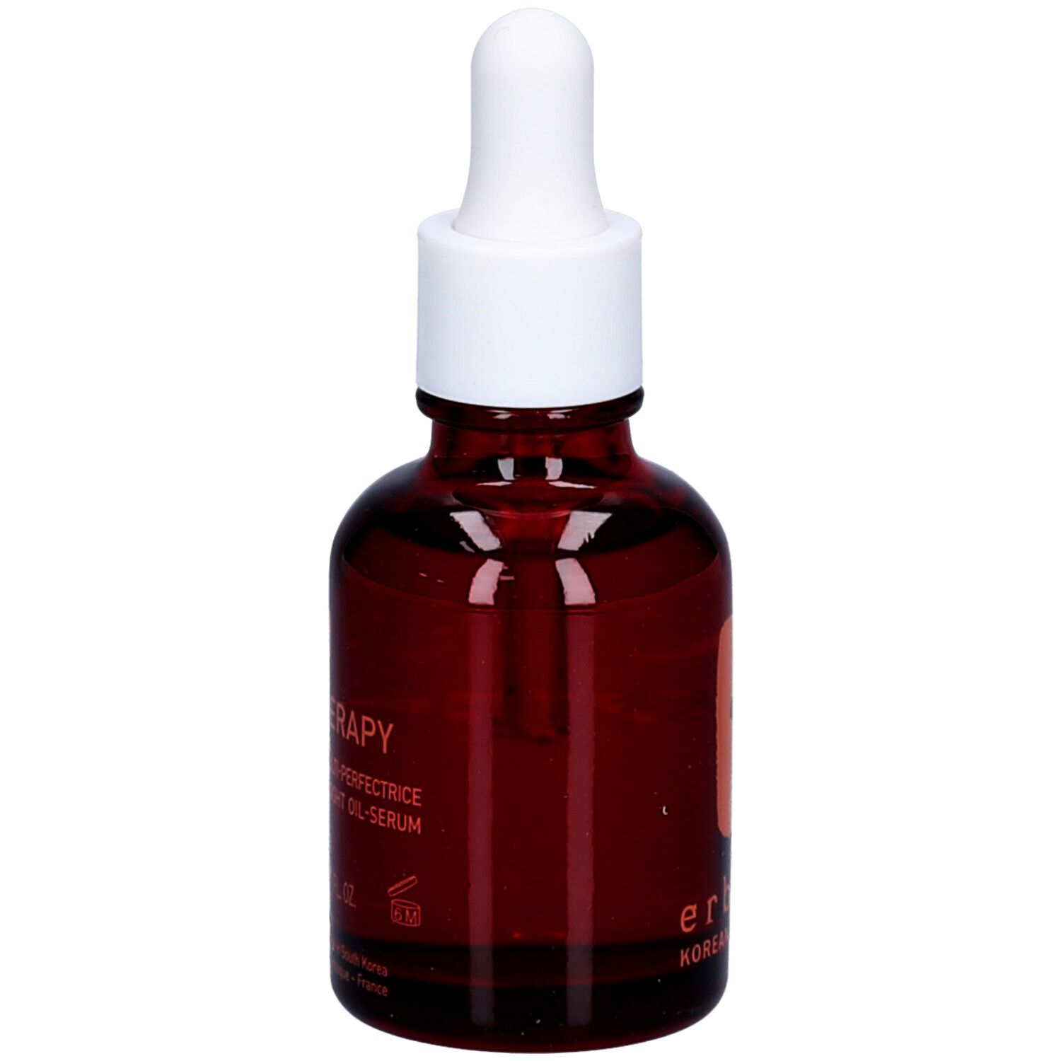 Braune Glasflasche mit weißem Deckel und Pipette. Aufschrift: Skin Therapy.