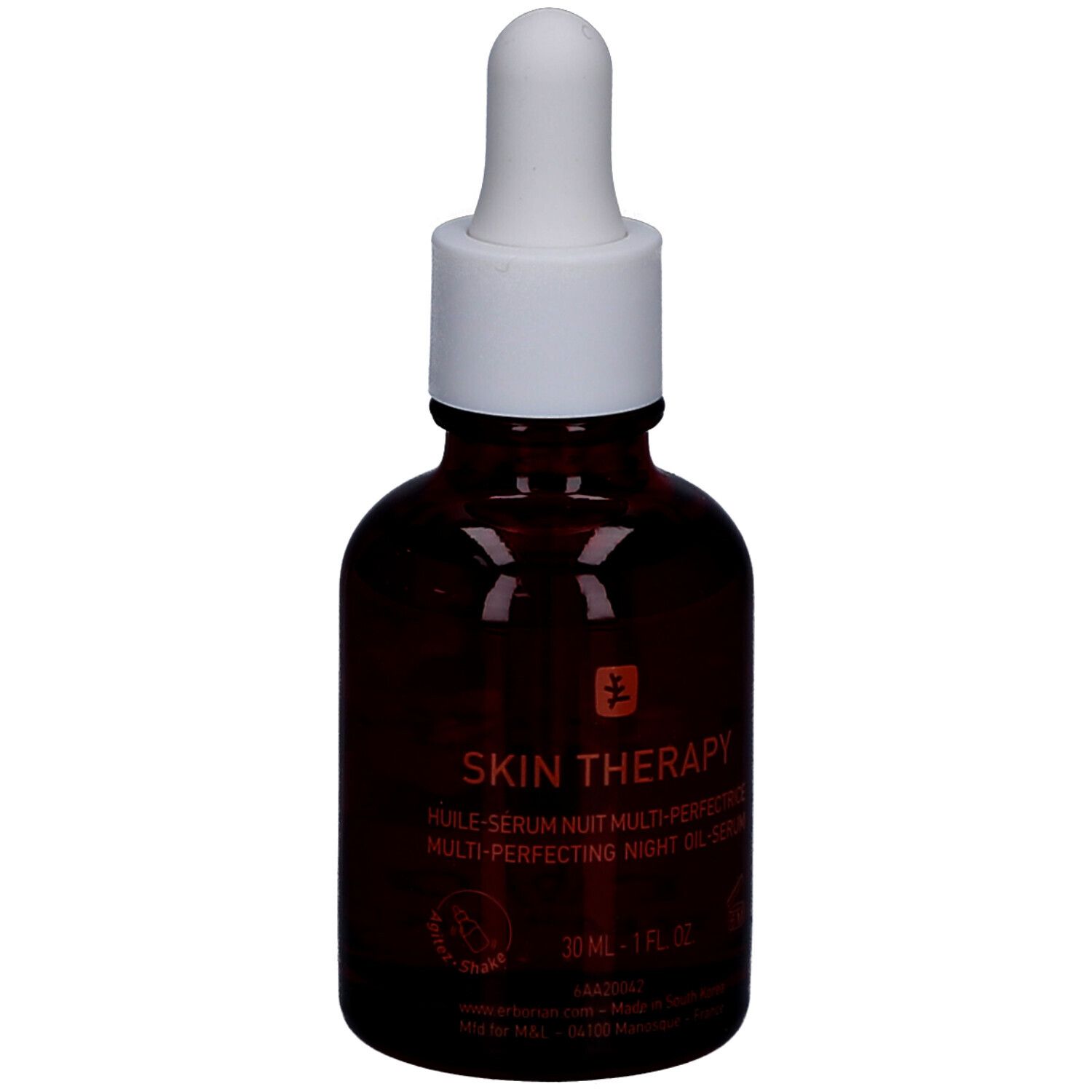 Braune Glasflasche mit weißem Deckel und Pipette. Aufschrift: Skin Therapy. 30 ml.