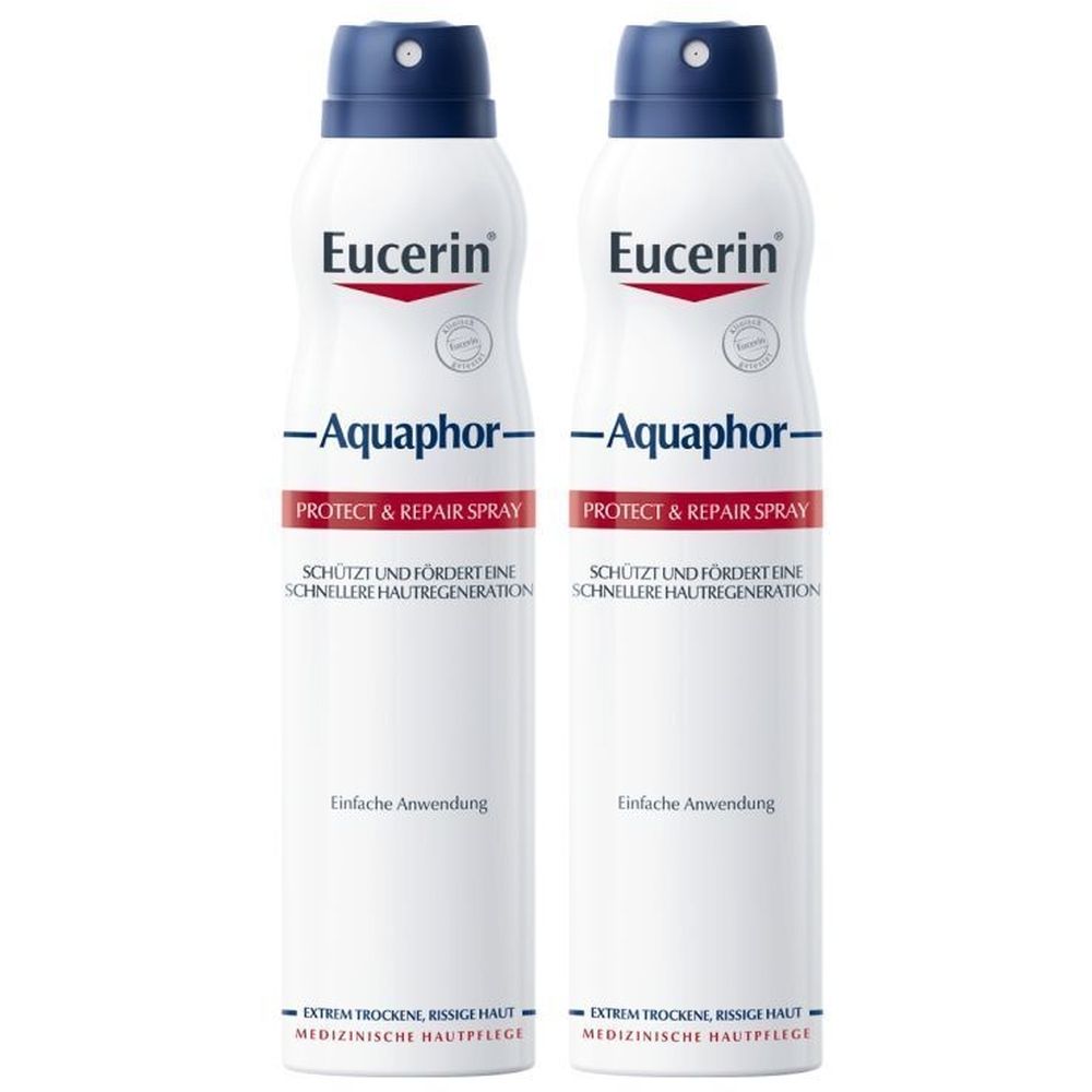 Zwei weiße Sprühflaschen mit blauem Deckel. Aufschrift: Eucerin Aquaphor Protect & Repair Spray. Medizinische Hautpflege.