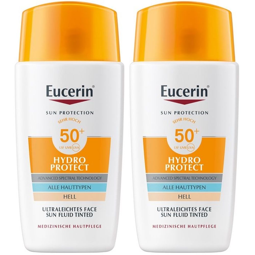 Zwei Flaschen Eucerin Hydro Protect Sonnenfluid. Weißes Fläschchen mit orangefarbenem Deckel. Aufschrift: 50+ UV-Schutz, getönt, für alle Hauttypen.
