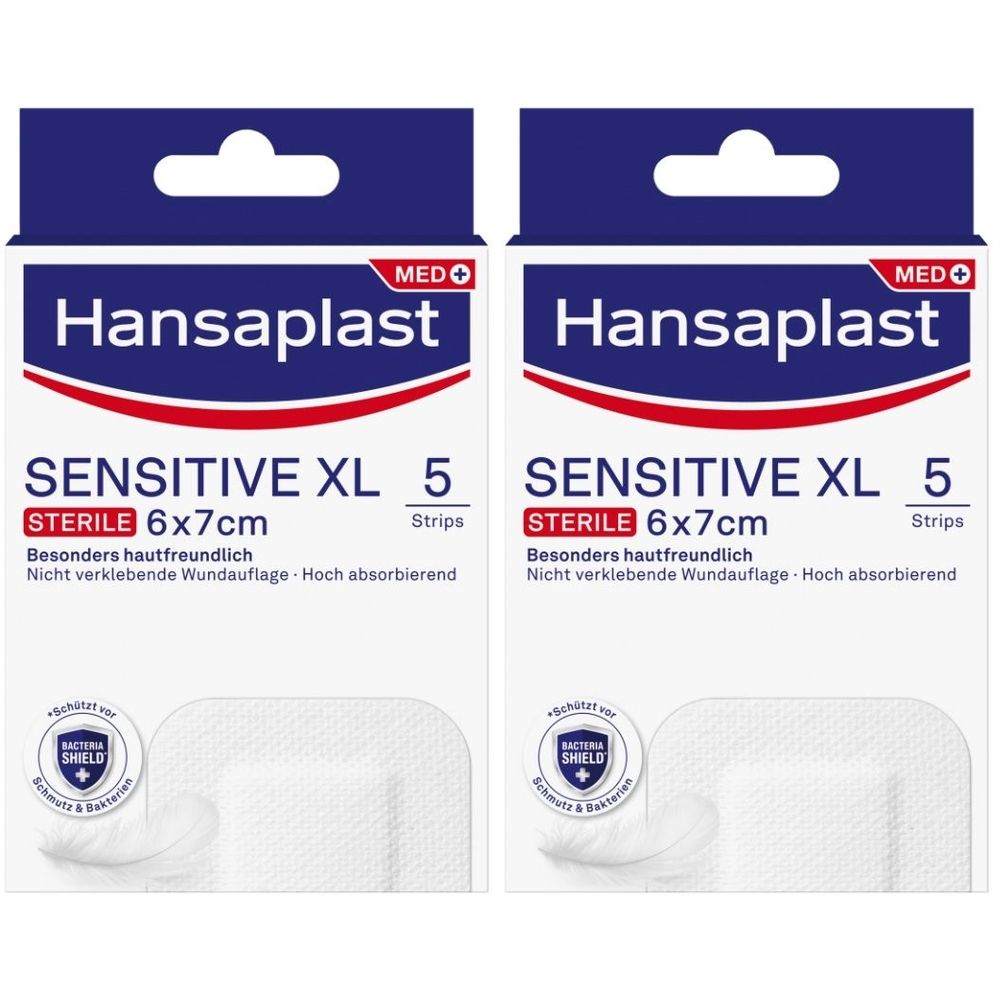 Zwei Packungen Hansaplast Sensitive XL Wundverband. Jede Packung enthält 5 sterile Pflaster, 6x7cm. Aufschrift: Besonders hautfreundlich.