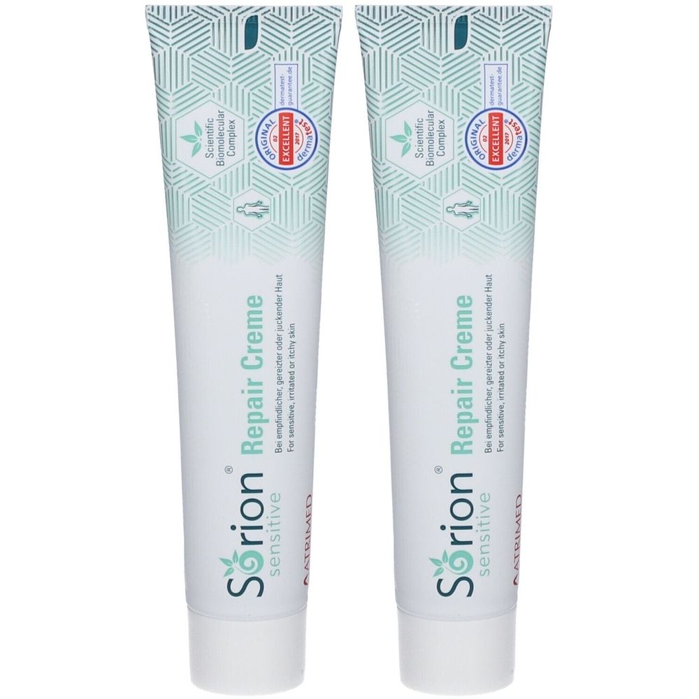 Zwei Tuben Creme. Aufschrift: Sorion Repair Creme sensitive. Mit Siegeln und Logos. Für empfindliche, gereizte Haut.