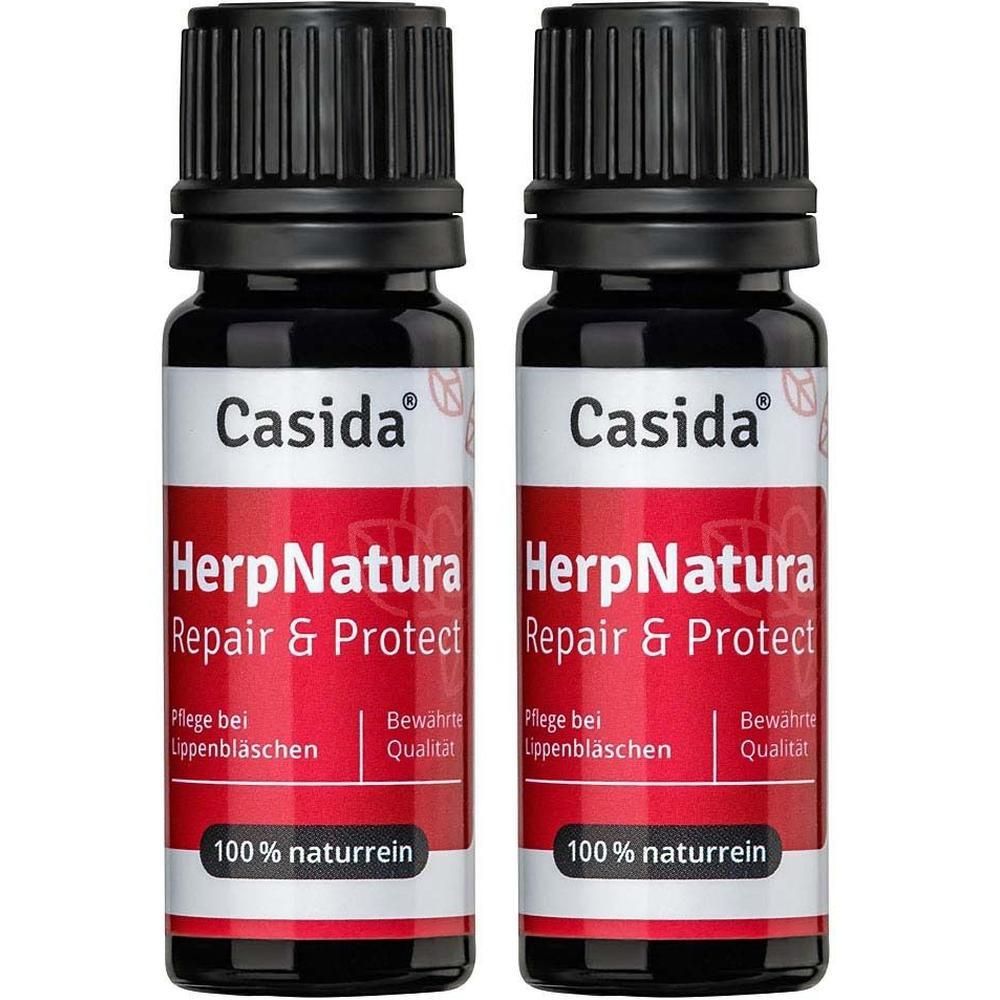 Zwei kleine braune Glasflaschen mit schwarzem Schraubverschluss, Etikett mit "Casida HerpNatura Repair & Protect".