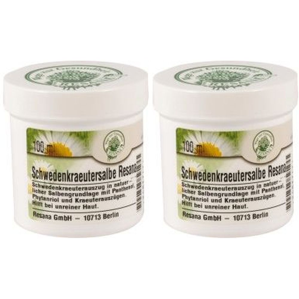 Zwei weiße Tiegel mit Deckel. Etikett mit Produktbezeichnung: Schwedenkräutersalbe Resana. Aufschrift: 100 ml. Hilft bei unreiner Haut.