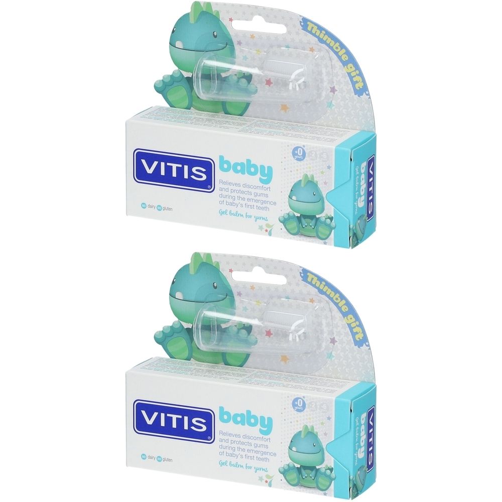 Zwei Packungen VITIS® Baby Gelbalsam. Jede Packung enthält einen Fingerzahnbürste und ein Dinosaurier-Design. Verpackung mit Produktnamen.