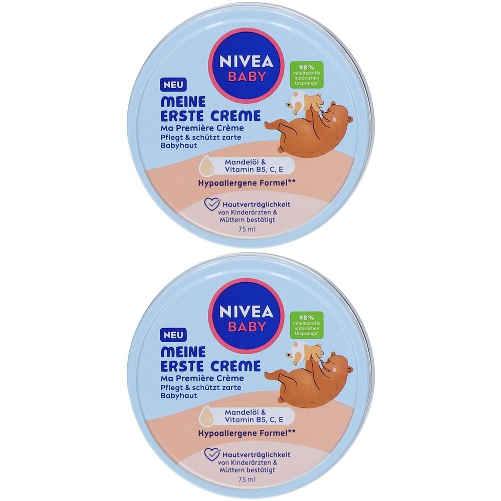 Zwei runde Dosen NIVEA BABY Meine Erste Creme. Blaue Deckel mit Produktnamen und Illustration eines Bären. Text: Hypoallergene Formel.