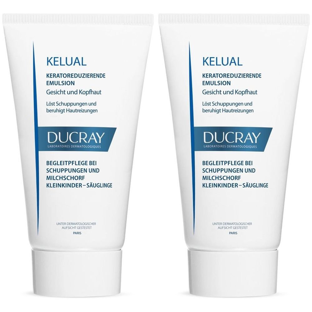 Zwei weiße Tuben mit blauer Schrift. Aufschrift: KELUAL, Emulsion, Gesicht und Kopfhaut. Marke: DUCRAY.