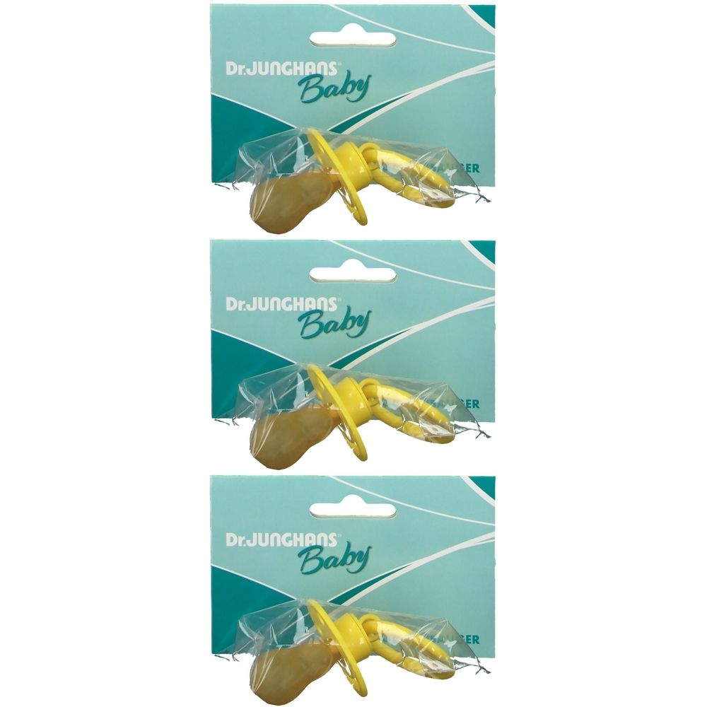 Drei gelbe Schnuller in Verpackung. Marke: Dr. Junghans Baby. Kirschform, Latex. Verpackt in Folie.