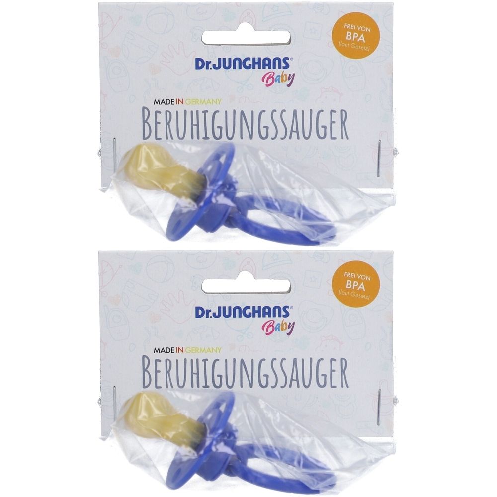 Zwei Schnuller in Verpackung. Blaue Halterung, gelber Sauger. Aufschrift: Dr. Junghans Baby, Made in Germany, BPA-frei.