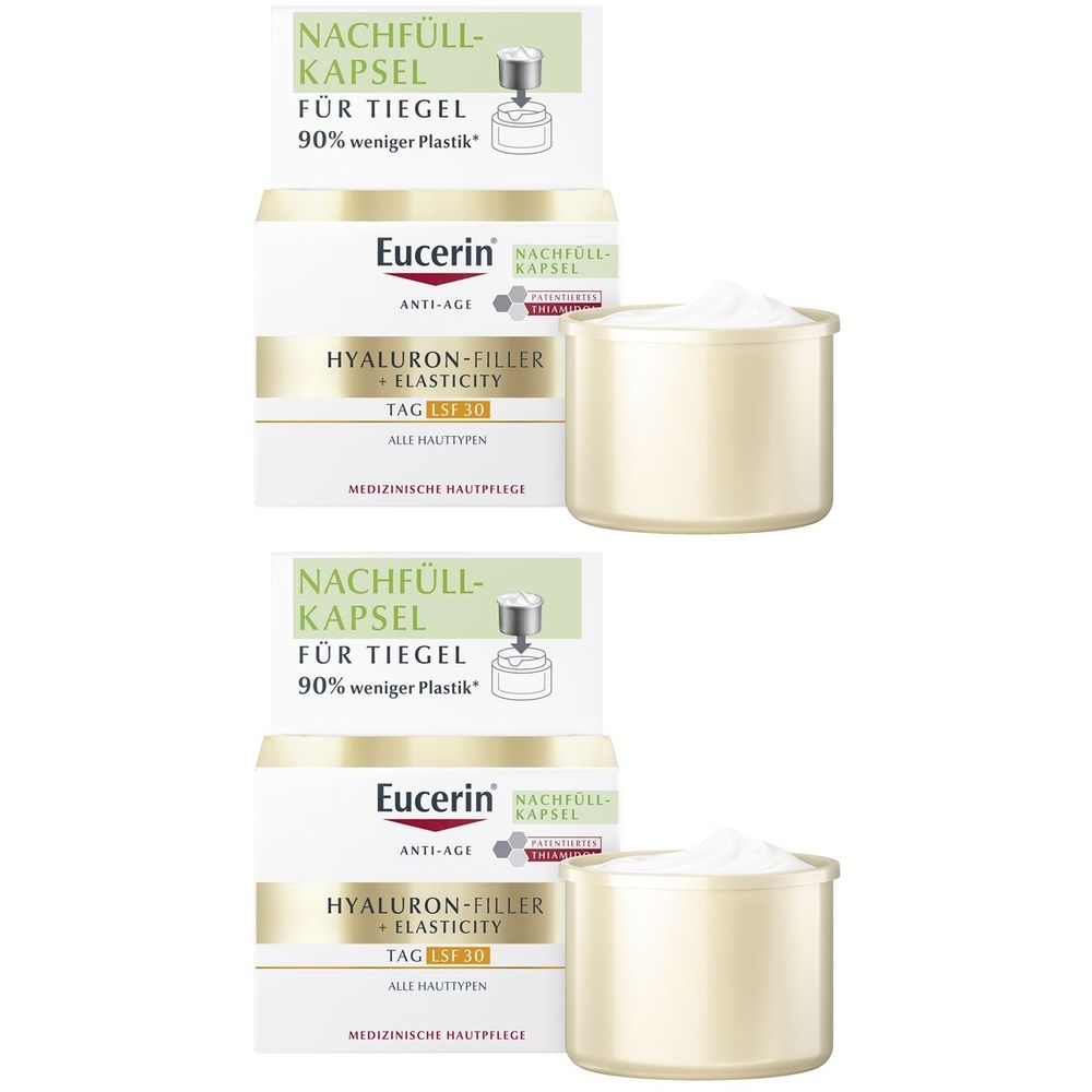 Zwei Packungen und Tiegel. Auf den Packungen steht "NACHFÜLL-KAPSEL". Darunter "Eucerin ANTI-AGE HYALURON-FILLER + ELASTICITY TAG LSF 30".