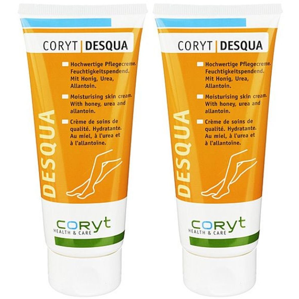 Zwei Tuben CORYT DESQUA Hautcreme. Orange-weiß. Text: Feuchtigkeitspendend, mit Honig, Urea, Allantoin. CORYT Health & Care Logo.