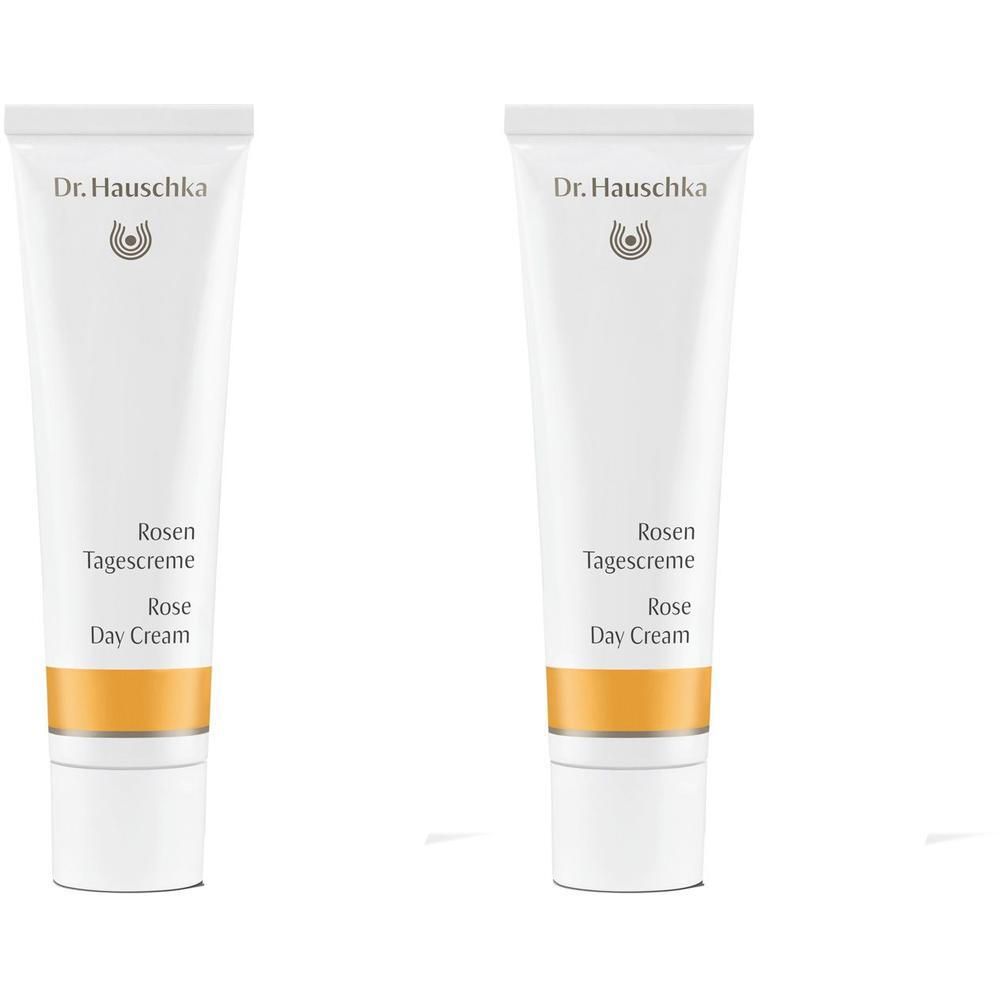 Zwei weiße Tuben Dr. Hauschka Rosen Tagescreme mit goldenem Streifen.