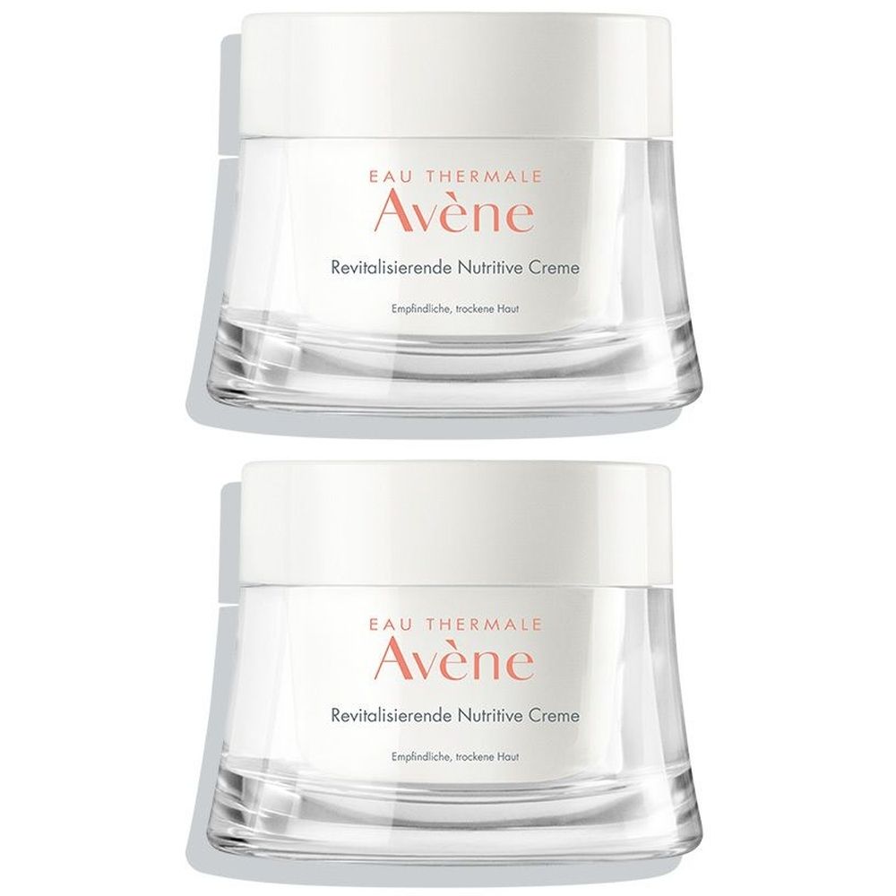 Zwei Tiegel Avène Revitalisierende Nutritive Creme. Weiße Deckel, transparente Gläser. Aufschrift: Eau Thermale Avène, Produktname.
