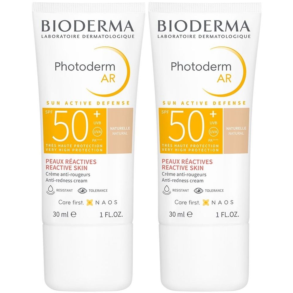 Zwei Tuben BIODERMA Photoderm AR LSF 50+. Weiß, mit gelben und beigen Akzenten. Text: Photoderm AR, 50+, Peaux Réactives, 30 ml.