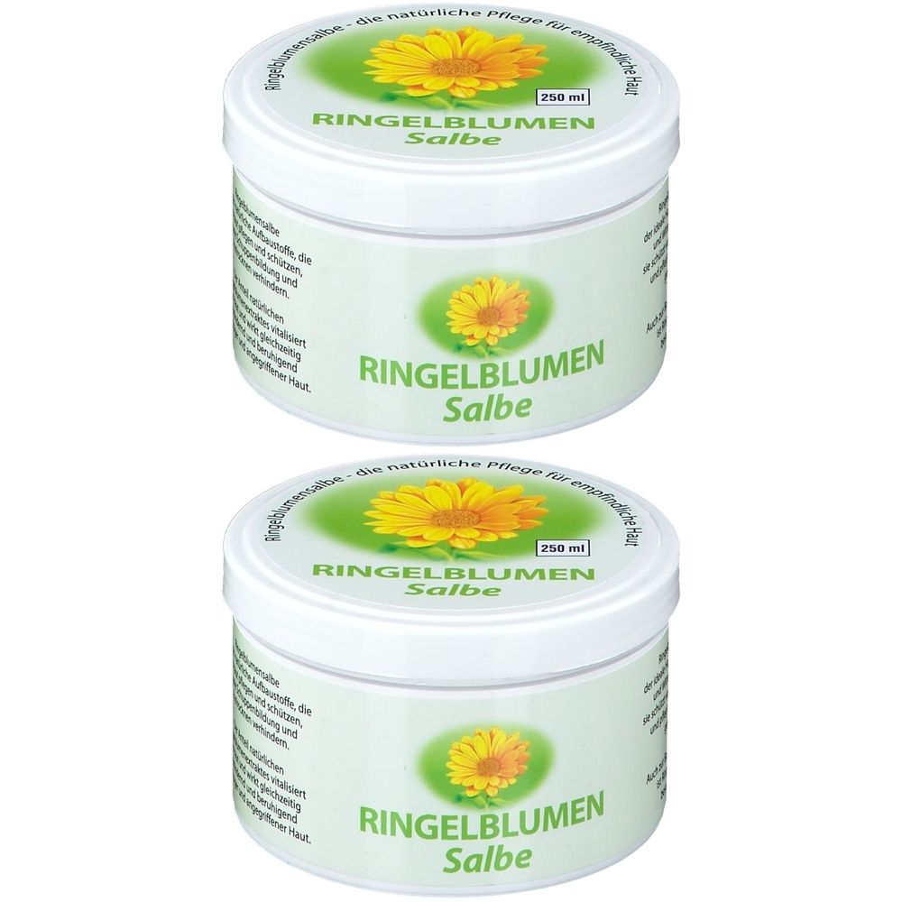 Zwei weiße Tiegel mit grünen Etiketten. Aufschrift: Ringelblumen Salbe. Oben gelbe Blüte. 250 ml.