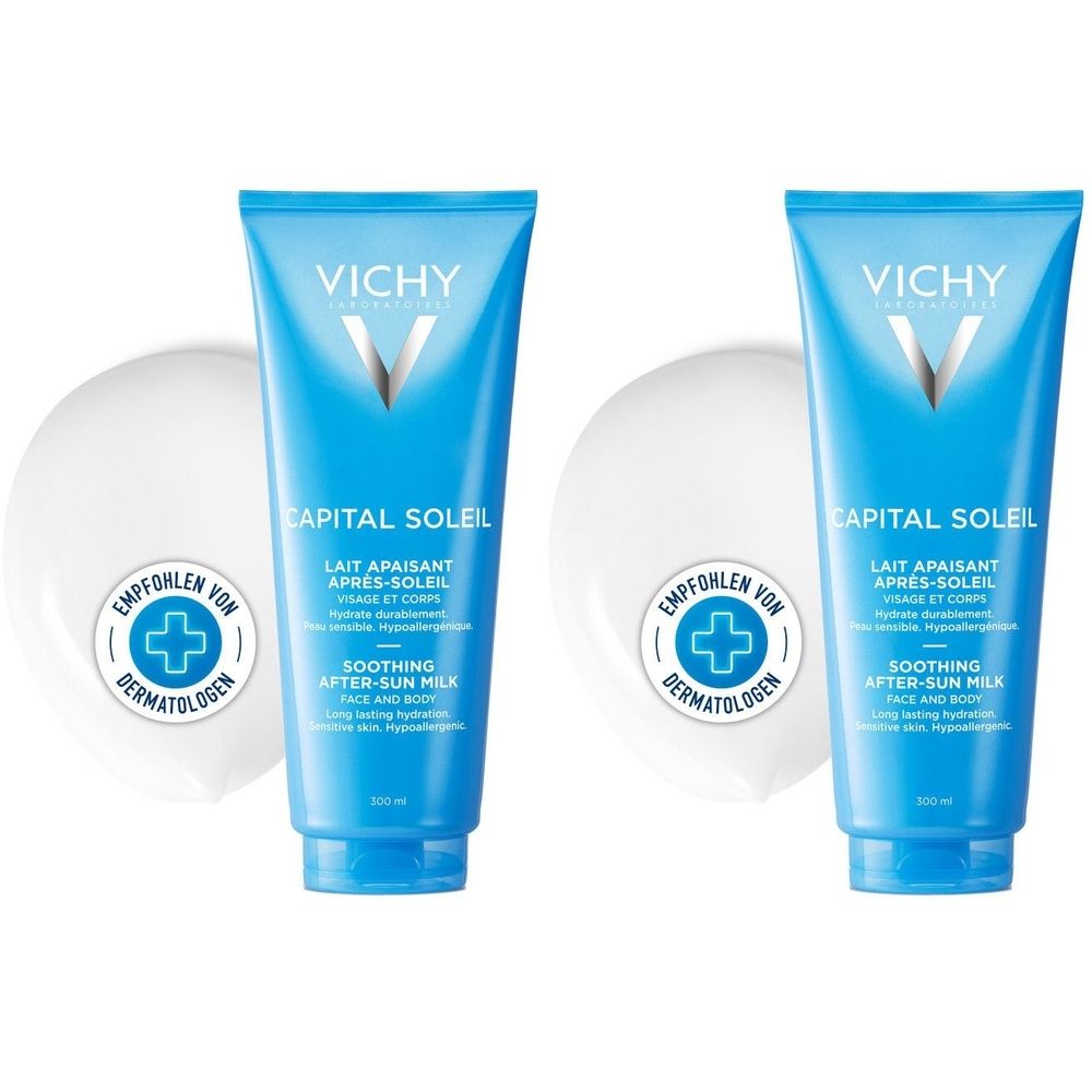 Zwei blaue Tuben mit weißem Deckel und Aufschrift CAPITAL SOLEIL. Daneben zwei weiße runde Etiketten mit blauem Kreuz.