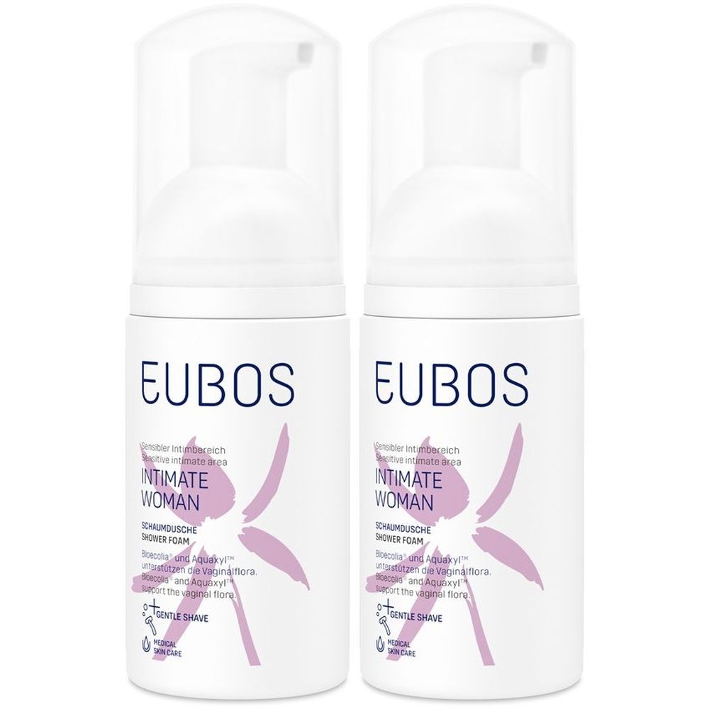 Zwei weiße Schaumdusche-Flaschen mit Pumpaufsatz. Aufschrift: EUBOS, INTIMATE WOMAN, Schaumdusche. Lila Grafik.