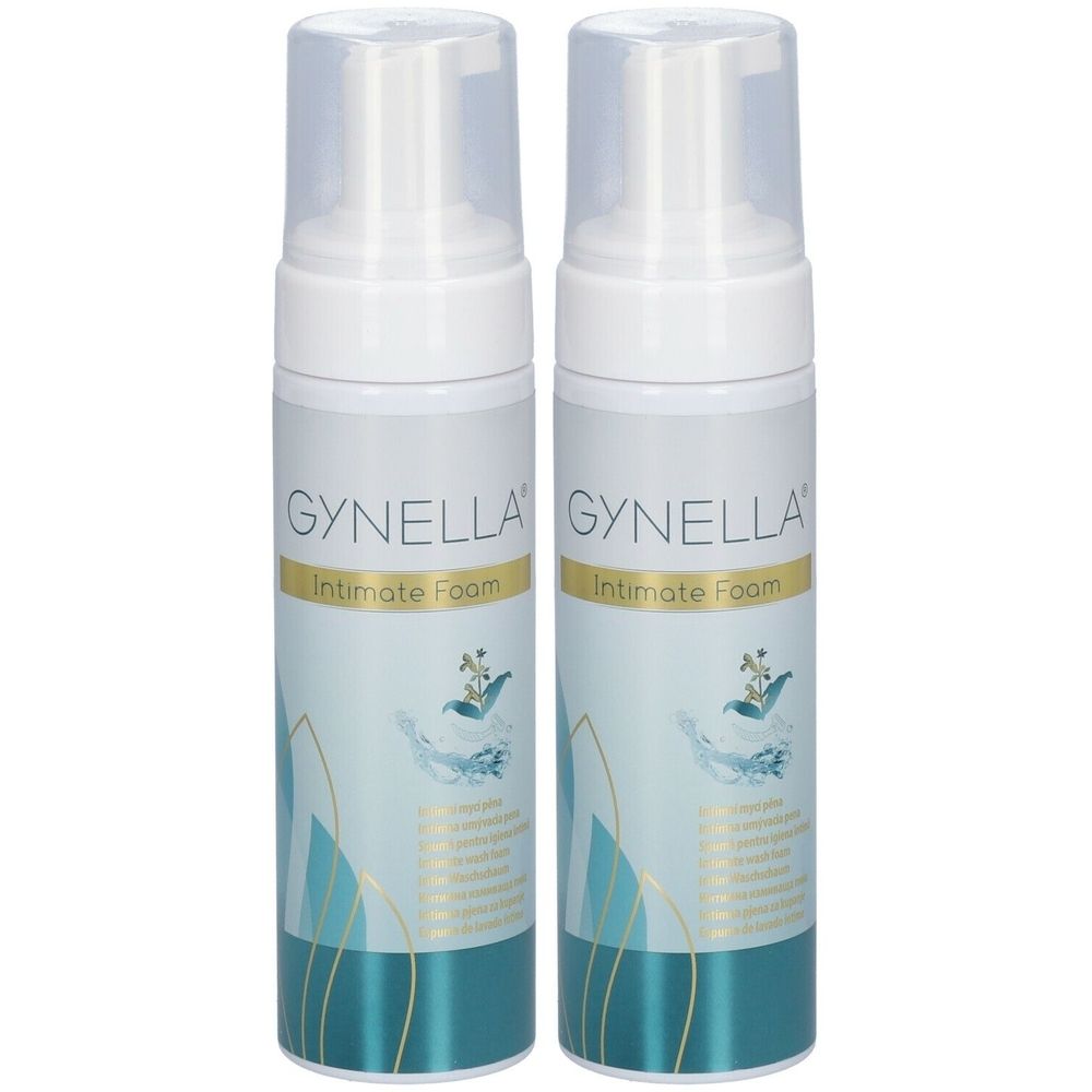 Zwei weiße Flaschen mit transparenten Kappen. Aufschrift: GYNELLA Intimate Foam. Türkis-goldfarbenes Etikett mit floralem Design.